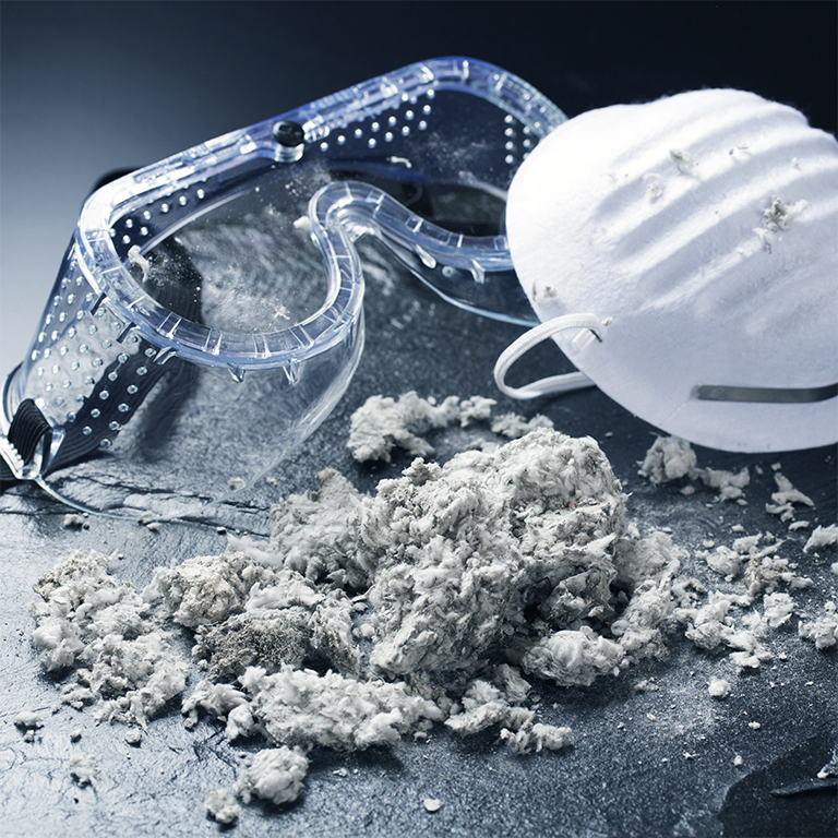 Asbestos fibre with protective eyewear and mask