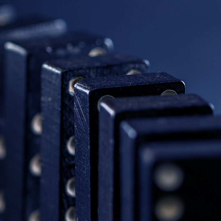 Domino formed in different ways, black, on black background. Each piece with some shade. Game of the domino.