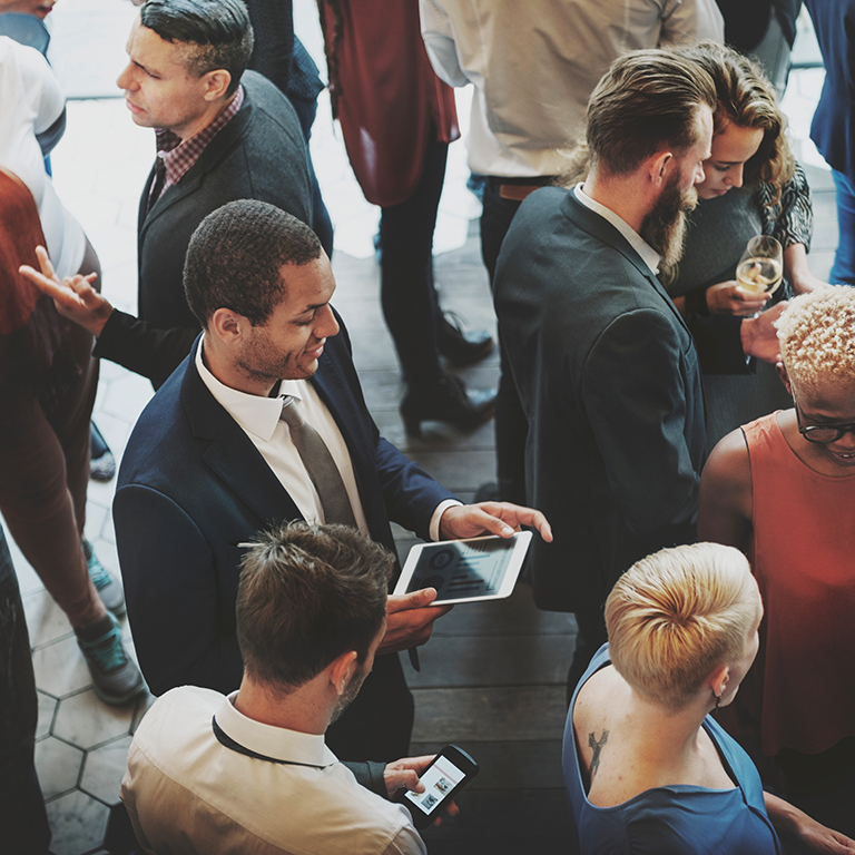 Diverse group of business people networking