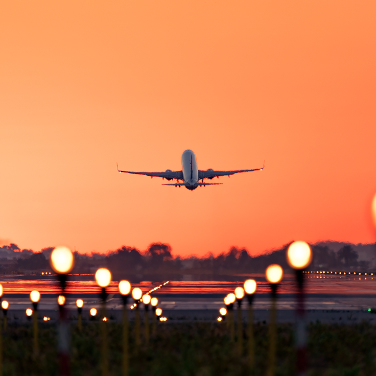 Plane Takeoff Sunset