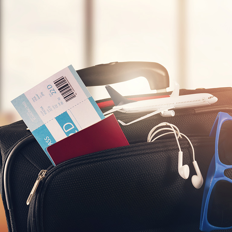 traveling luggage on airport terminal background with copy space